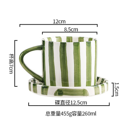 A ceramic coffee cup and saucer set