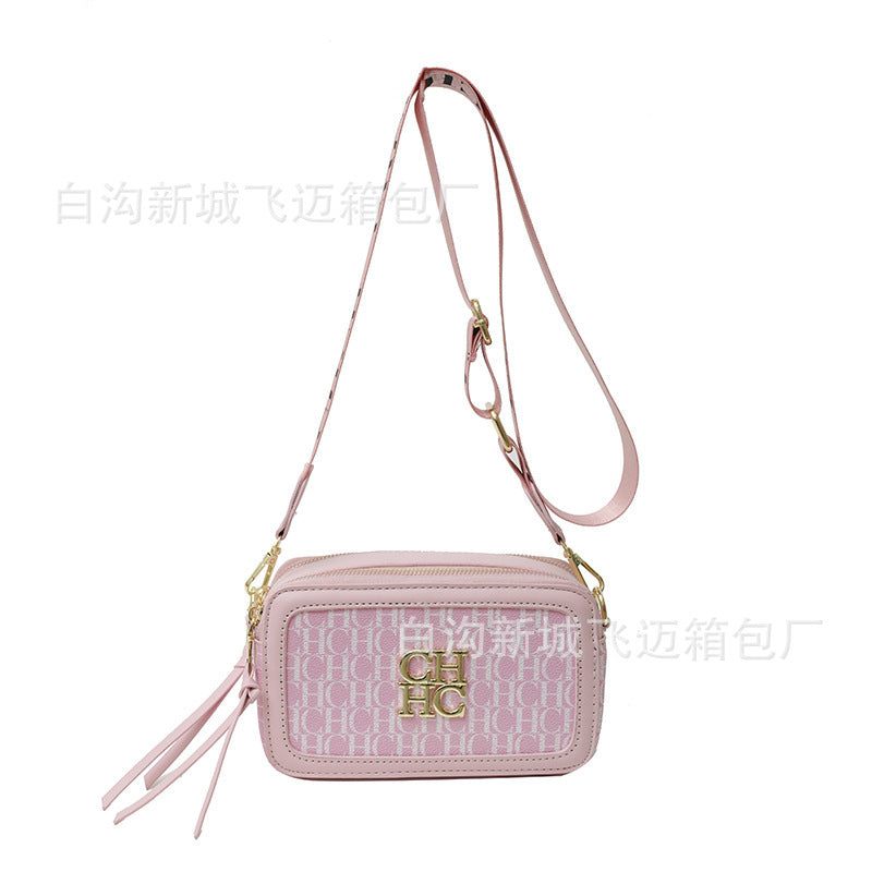 A Europe and the United States new personality letter style color fashion popular letter solid color shoulder messenger bag tide