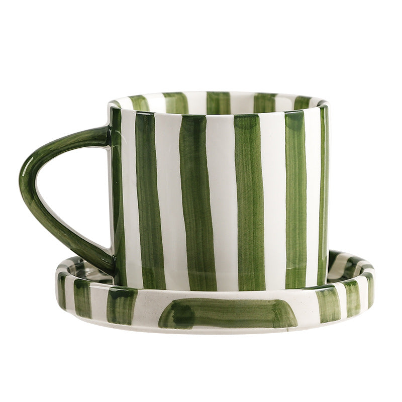 A ceramic coffee cup and saucer set