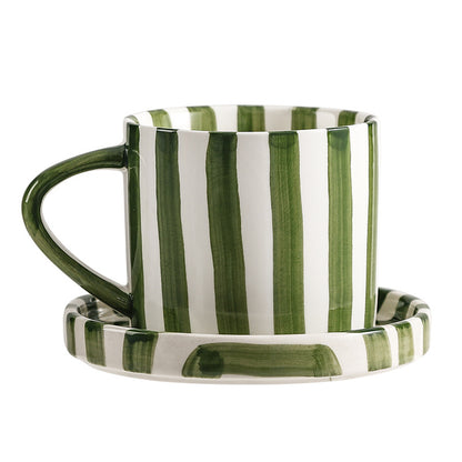 A ceramic coffee cup and saucer set