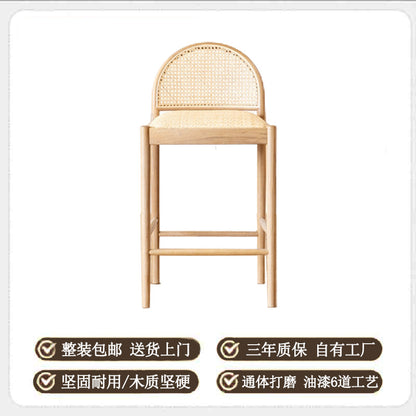A solid wood rattan chair