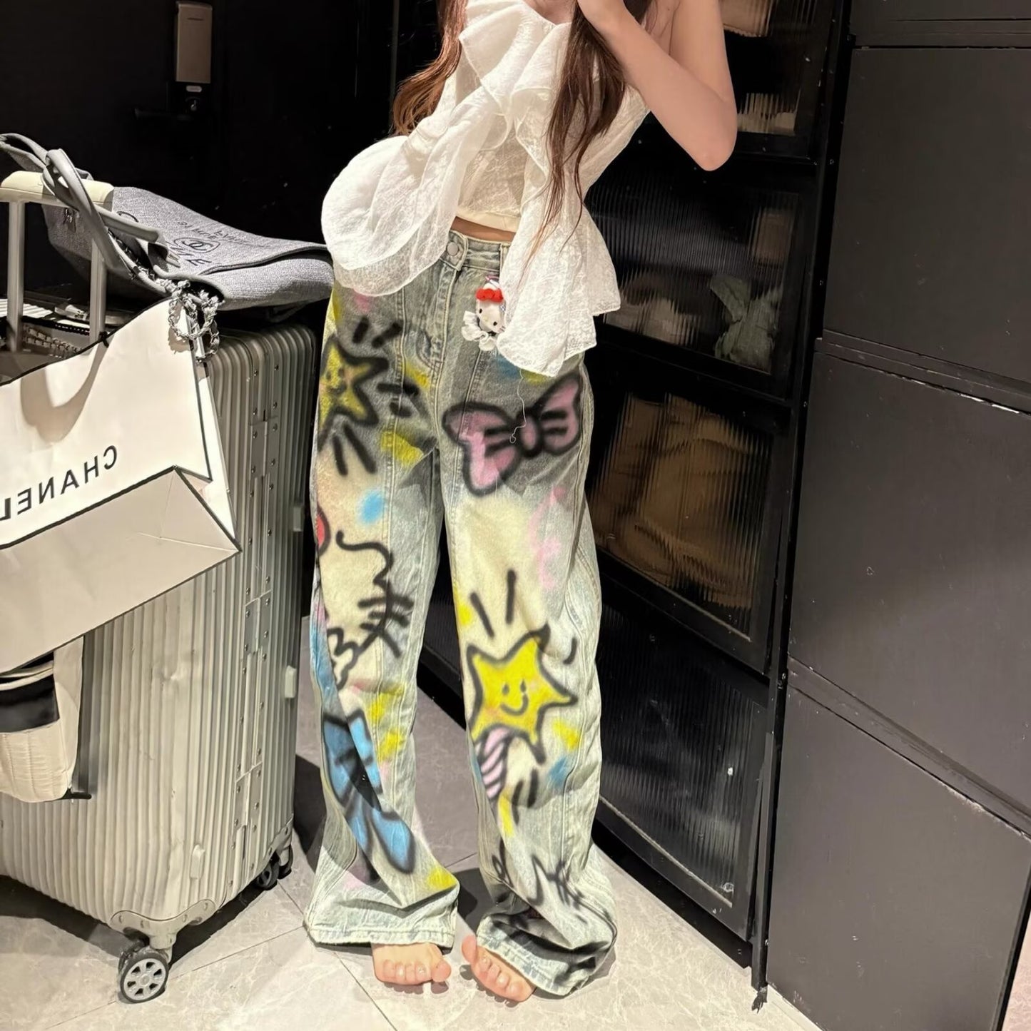 A graffiti print jeans