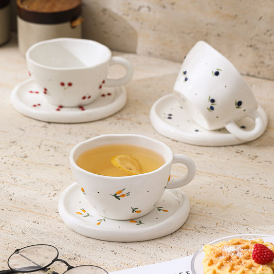 A Embossed Ceramic Coffee Cup and Saucer Set