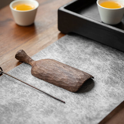 A Pure handmade hammered black walnut tea