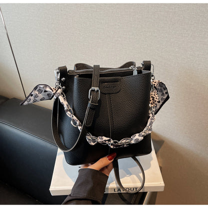 A handbag shoulder messenger bag