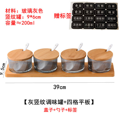 A kitchen seasoning box bamboo cover glass jar
