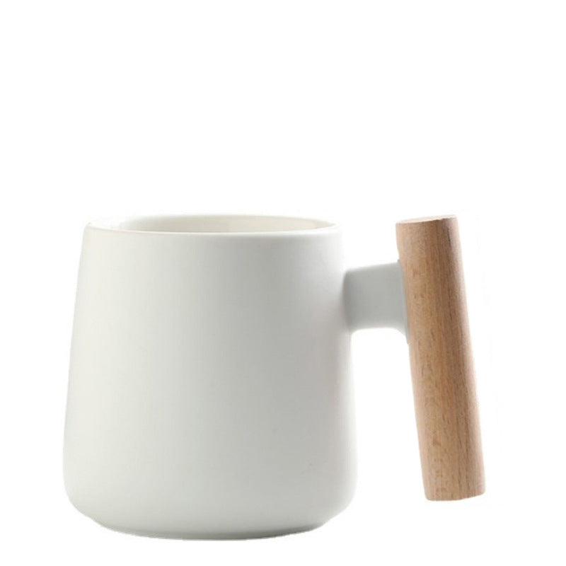 A wooden handle ceramic water cup