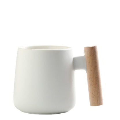 A wooden handle ceramic water cup
