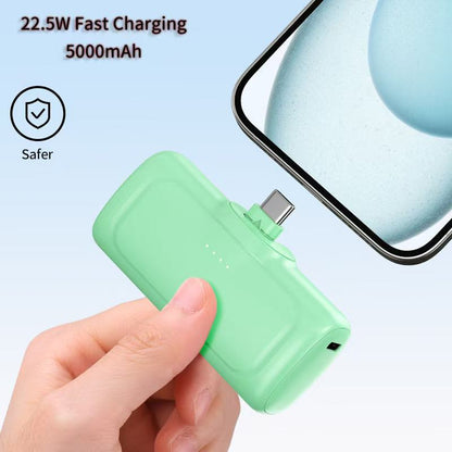 A capsule power bank 5000 mAh with its own cable portable mobile power supply