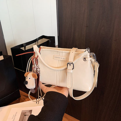 A handbag messenger bag