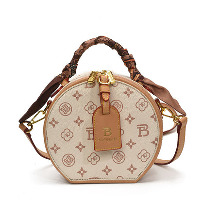 A new high-end printed apple bag niche light luxury fashion versatile shoulder messenger bag portable round cake bag