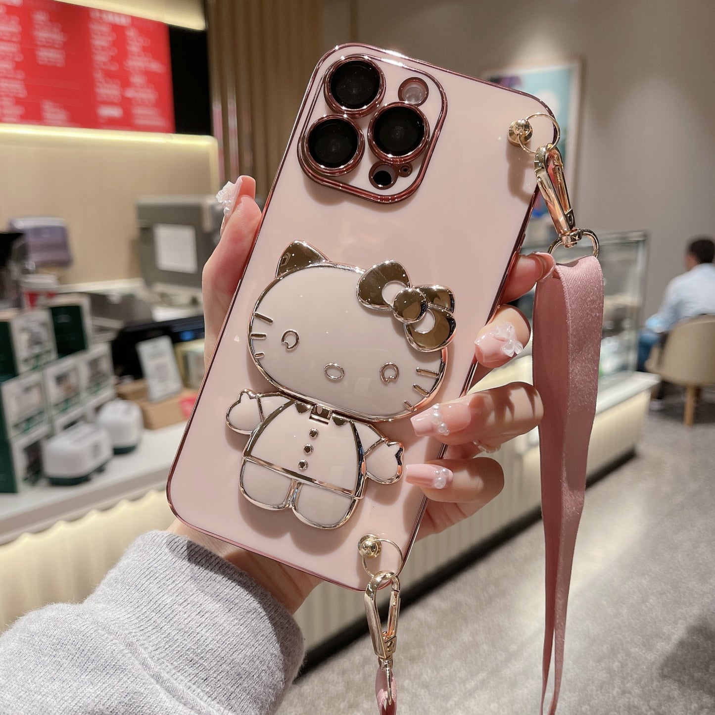A makeup mirror crossbody rope mobile phone case