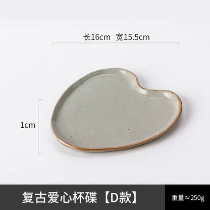 A ceramic coffee cup and saucer set