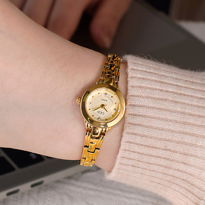 A niche light luxury small exquisite alloy bracelet watch high-end sense diamond-encrusted women's waterproof quartz watch