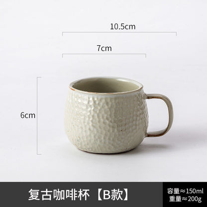 A ceramic coffee cup and saucer set