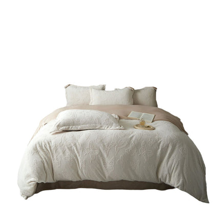 A four-piece set of sheets and quilt covers