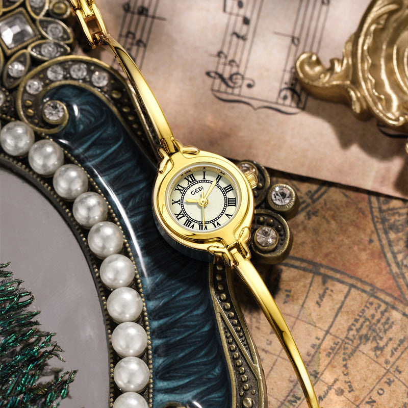 A bracelet watch small retro bracelet women's watch gold high value fine belt quartz watch