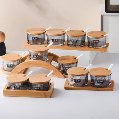 A kitchen seasoning box bamboo cover glass jar