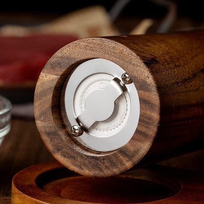 A lobular acacia cylindrical pepper grinder