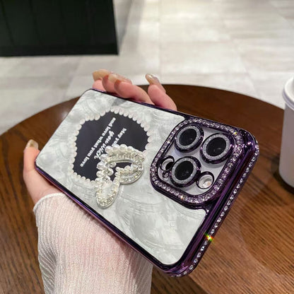 A three-dimensional pearl love mirror mobile phone case