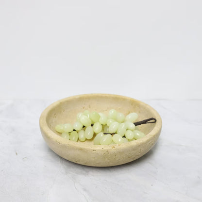 صينية زخرفية دائرية الشكل مصنوعة من رخام الترافرتين 