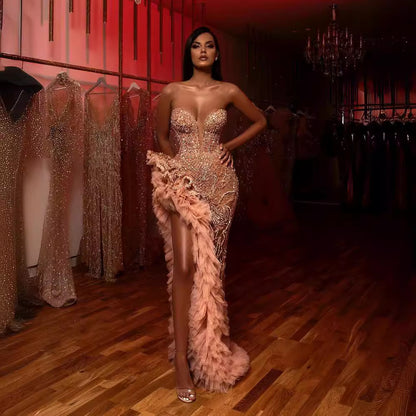 A summer new European and American women's clothing Amazon dress fringed tail sexy gold tube top evening dress