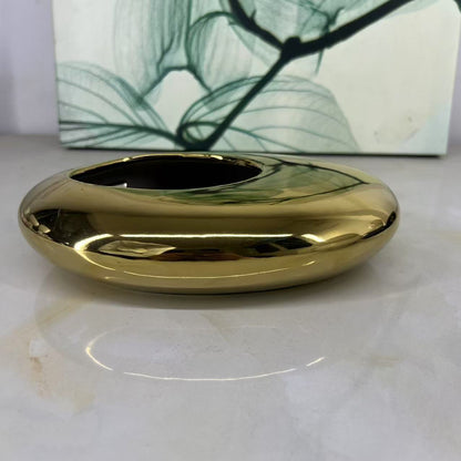 A ceramic flower pot potting container