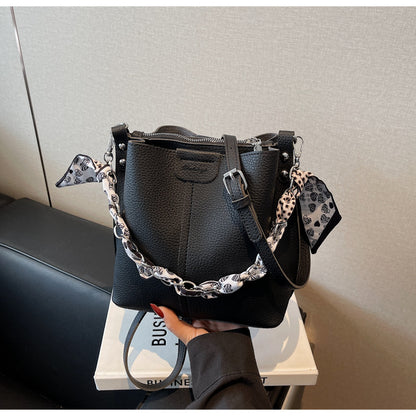 A handbag shoulder messenger bag