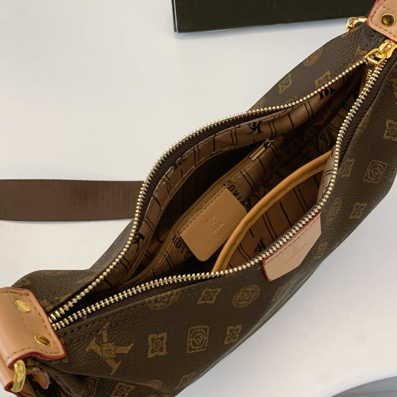 A new versatile large-capacity commuting dumpling bag retro printed messenger bag bag female