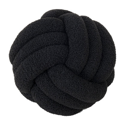 A braided knotted ball pillow