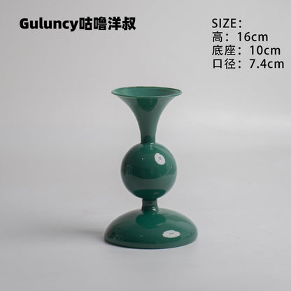 A vintage French Roman column glass candle holder