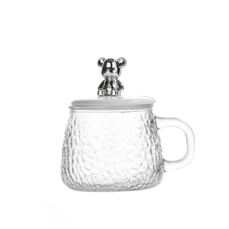 A bear mug a glass cup