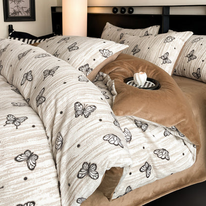 A four-piece quilt cover on the bed