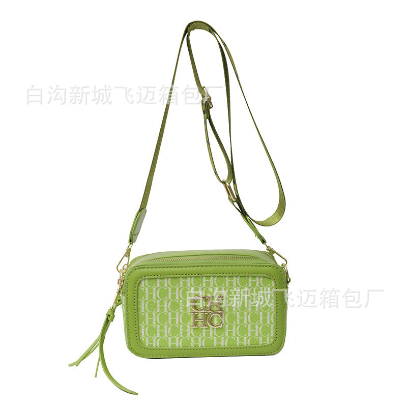 A Europe and the United States new personality letter style color fashion popular letter solid color shoulder messenger bag tide