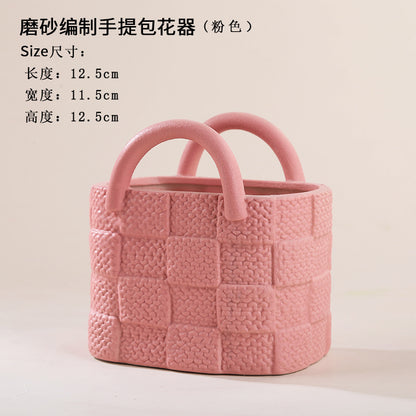 A ceramic handbag vase ornament