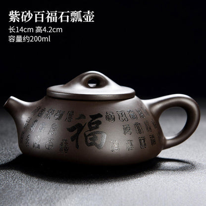 A purple clay pot teapot
