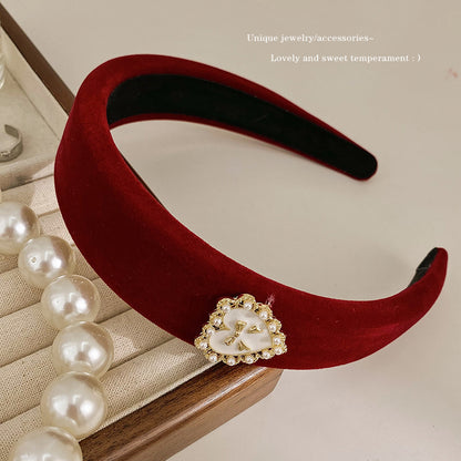 A new autumn and winter red velvet headband retro female Internet celebrity pressure hair wide edge high skull top hair accessories simple temperament headband