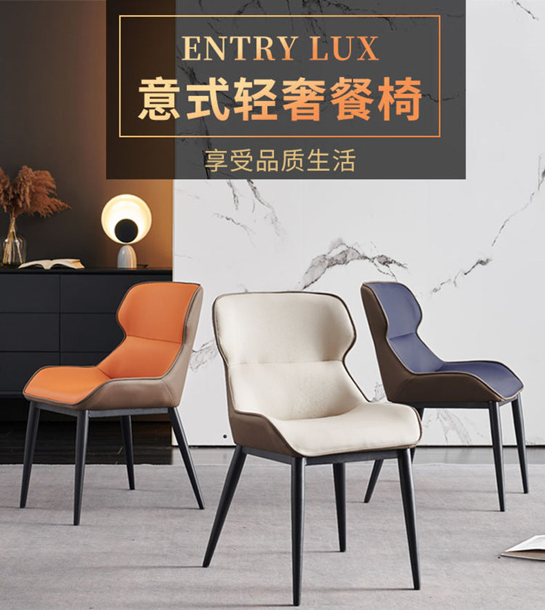 A wrought iron leather chair seat