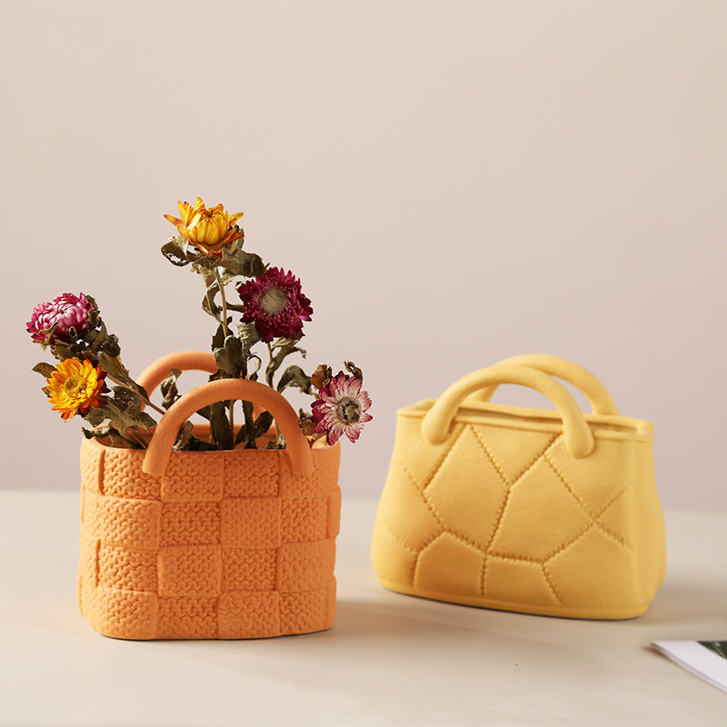 A ceramic handbag vase ornament