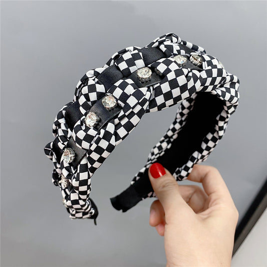 A Korean retro letter plaid headband, four-strand braided personalized hair accessories, wide-brimmed small fragrant headband