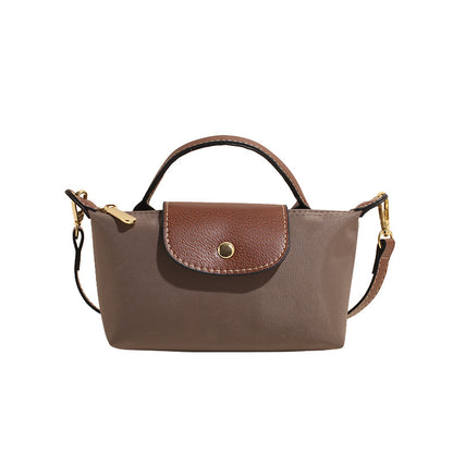A new Oxford cloth women's bag fashion splicing dumpling bag simple handbag premium texture commuter bag