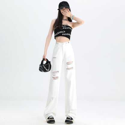 A pair of ripped white jeans