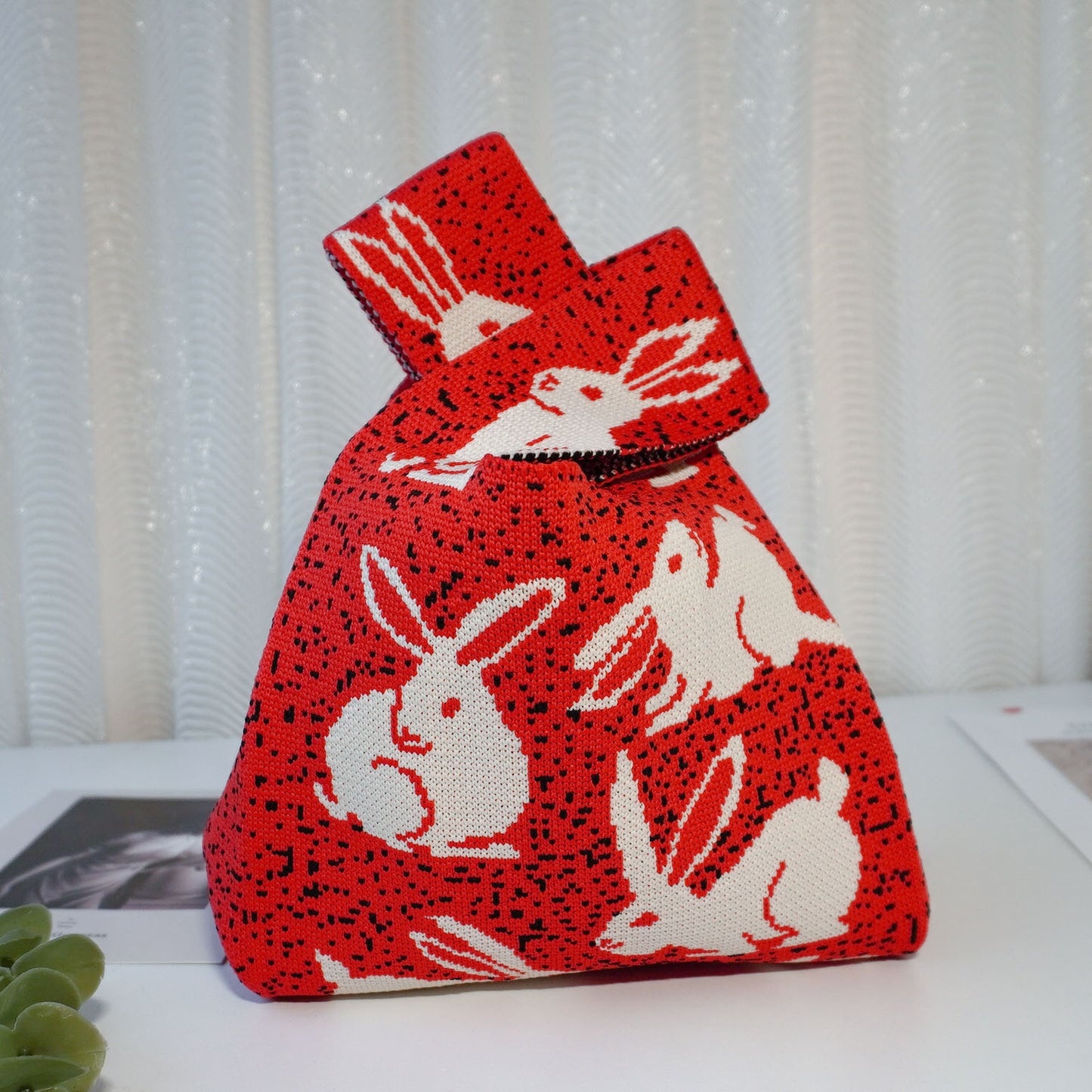 A small bag knit bag handbag