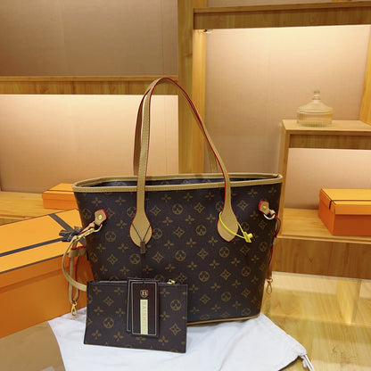 A large-capacity soft leather texture handbag, fashionable printed retro shoulder bag, commuter to work, tablet storage, tote bag.