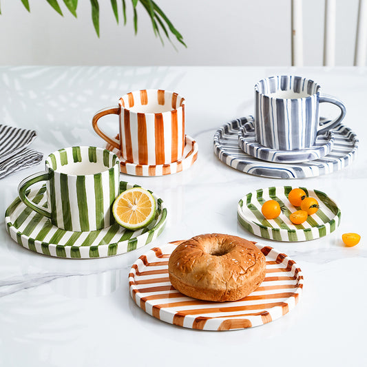 A ceramic coffee cup and saucer set