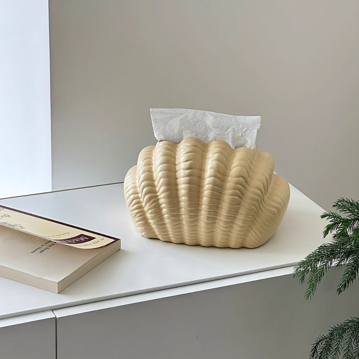 A ceramic tissue box ornament