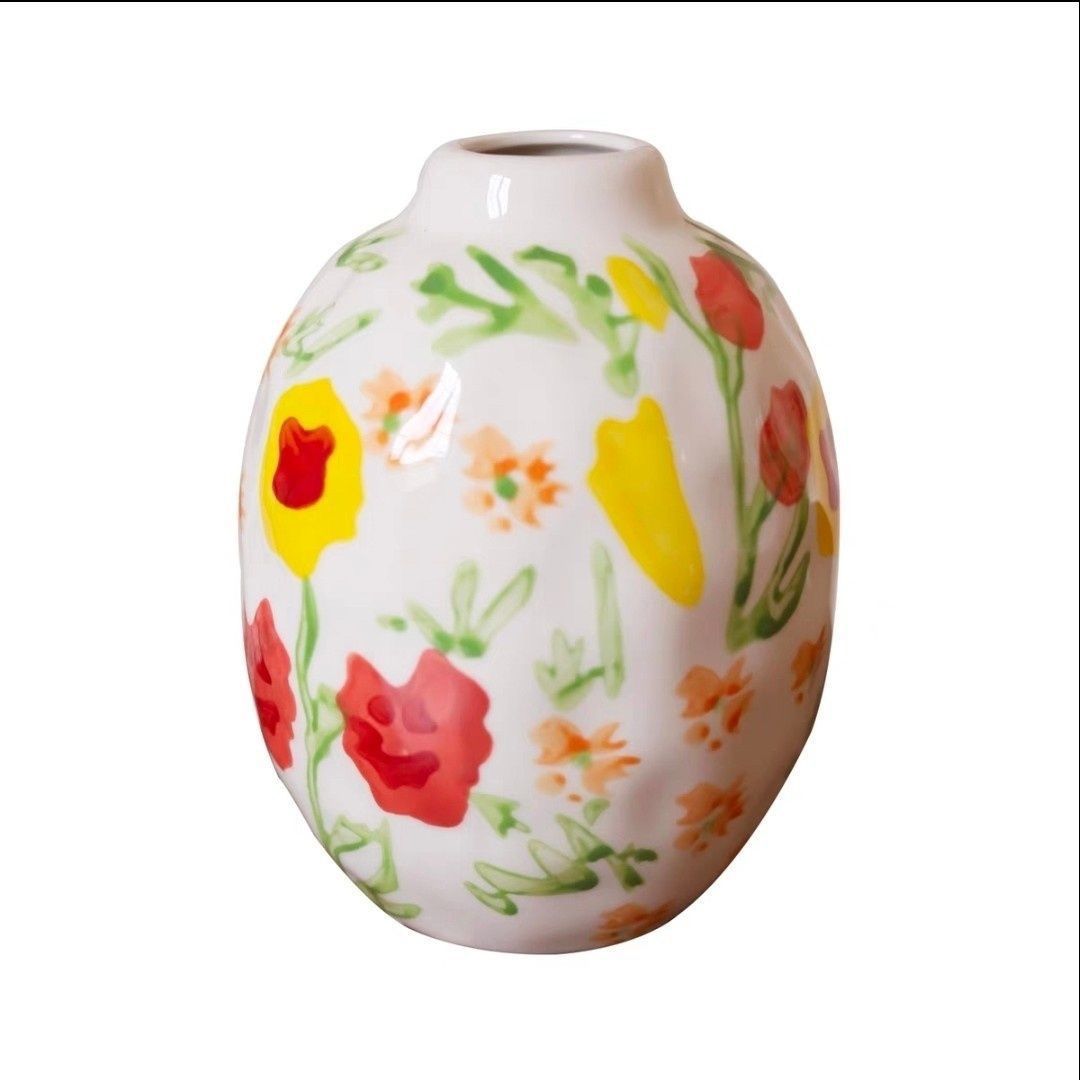 A colorful hand-painted ceramic vase ornament