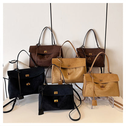 A suede shoulder bag
