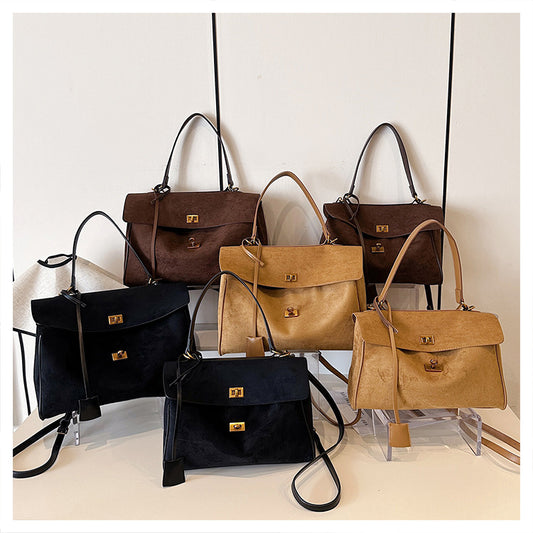 A suede shoulder bag