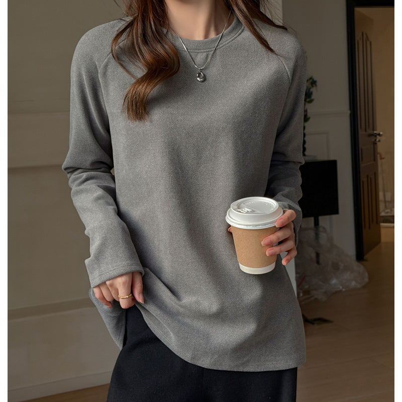 A crewneck long-sleeved top